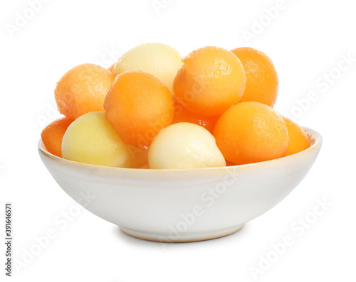 Melon balls in bowl isolated on white