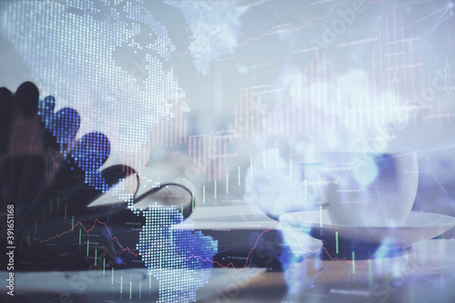 Wallpaper Mural Double exposure of financial chart drawing and desktop with coffee and items on table background. Concept of forex market trading Torontodigital.ca
