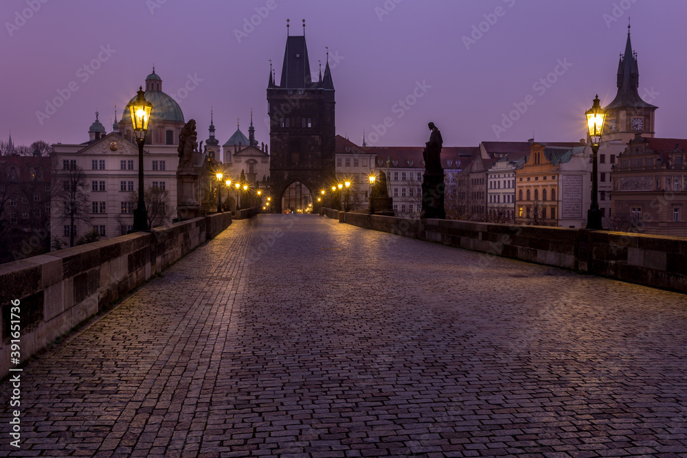 In the morning on Charles Bridge in Prague In the morning on Charles Bridge in Prague