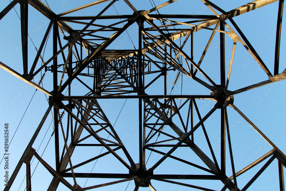 Electric power pylon and overhead lines tower used transmit electrical energy