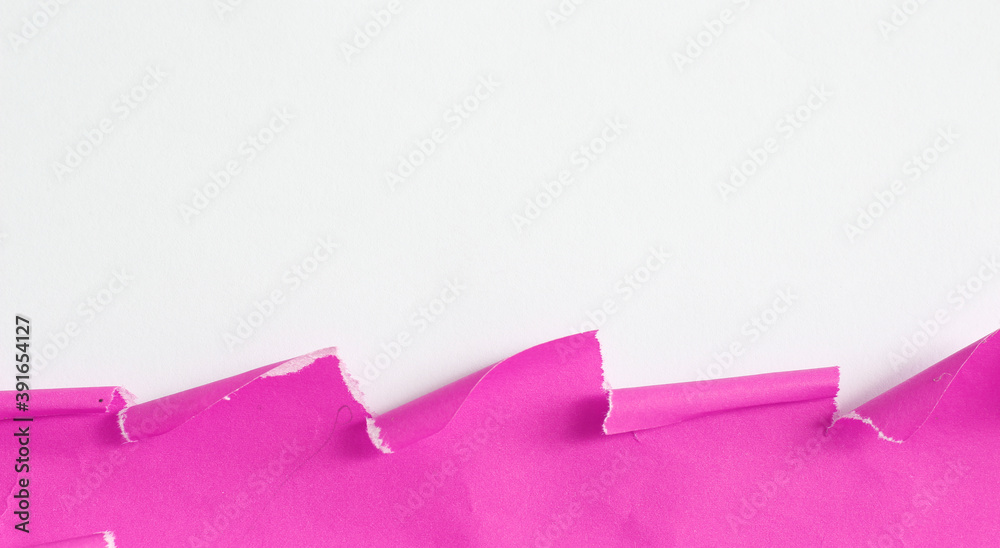 ripped pink paper on white paper background ripped pink paper on white paper background