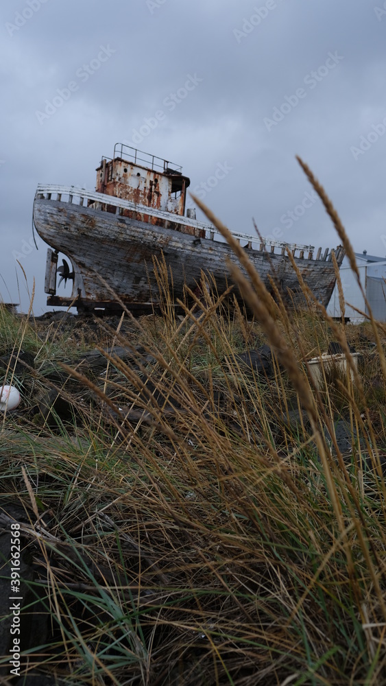 Shipwreck decaying in Akranes (Iceland).