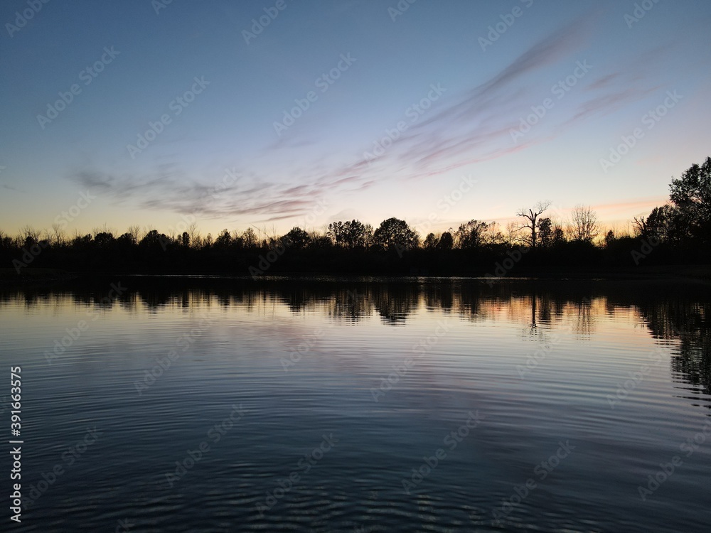 Fototapeta premium sunset over the river
