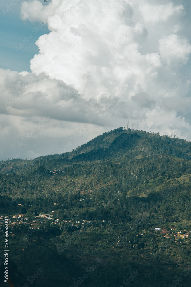 A beautiful mountain touching the clouds A beautiful mountain touching the clouds