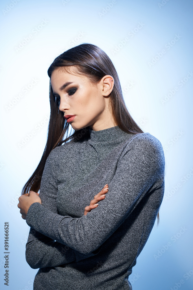 attractive woman bright makeup straightens her hair with hand elegant style model attractive woman bright makeup straightens her hair with hand elegant style model