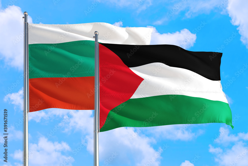 Palestine and Bulgaria national flag waving in the windy deep blue sky. Diplomacy and international relations concept. Palestine and Bulgaria national flag waving in the windy deep blue sky. Diplomacy and international relations concept.