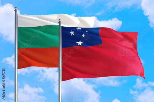 Samoa and Bulgaria national flag waving in the windy deep blue sky. Diplomacy and international relations concept.