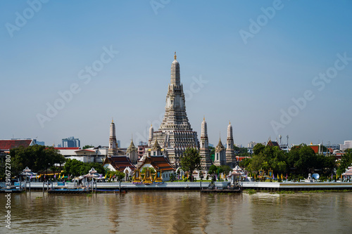 Wat Arun Temple with Chao Phraya river in Bangkok, Thailand