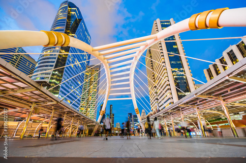 Chong Nonsi skywalk at night in Bangkok, Thailand photo