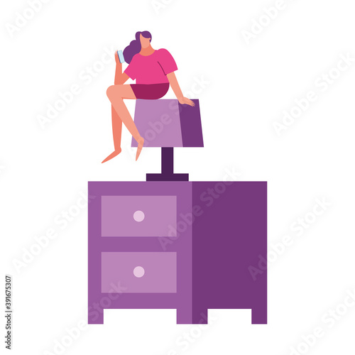 young woman using smartphone seated in drawer with imnsomia