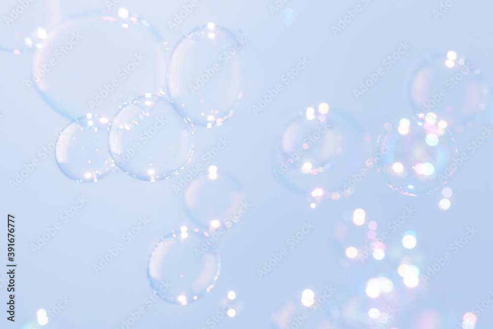 Beautiful shiny blue soap bubbles texture background. Abstract, Natural fresh soapy summer background. Beautiful shiny blue soap bubbles texture background. Abstract, Natural fresh soapy summer background.