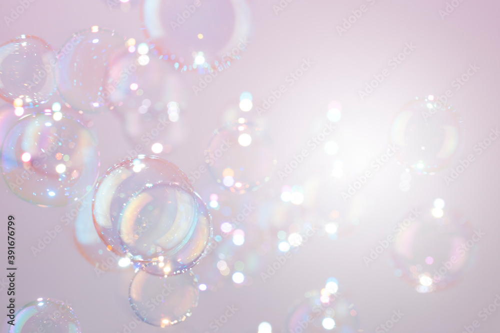 Fototapeta premium Beautiful shiny pink soap bubbles texture background. Abstract, Natural fresh soapy summer background.