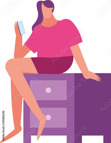 young woman using smartphone with imnsomia seated in drawer