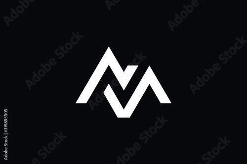 NM logo letter design on luxury background. MN logo monogram initials letter concept. NM icon logo design. MN elegant and Professional letter icon design on black background. M N NM MN