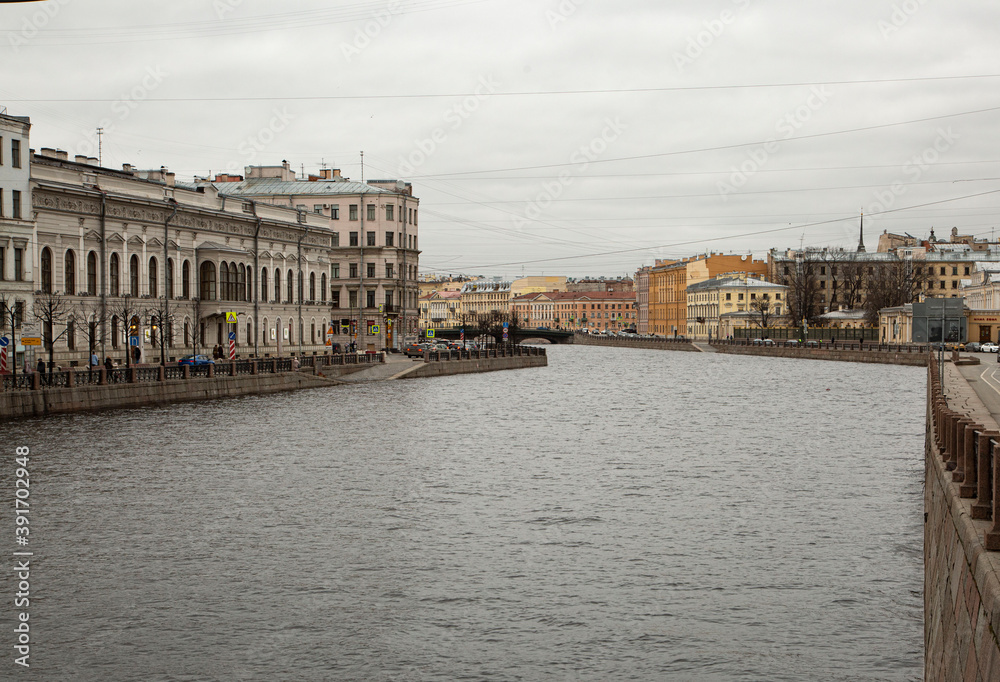 Griboyedov Canal embankment on a cloudy day, Petersburg, Russia.