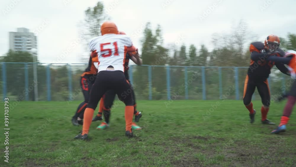 American football, football team in the game, aggressive confrontation training. American football, football team in the game, aggressive confrontation training.