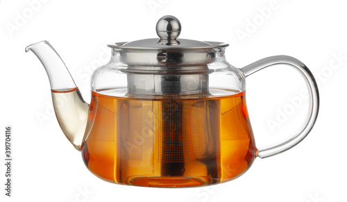 Glass teapot with black tea isolated on white