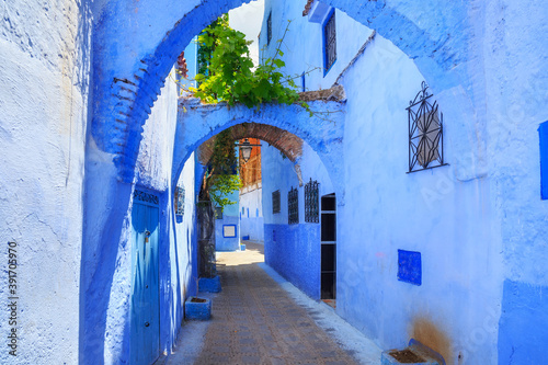 View of the blue walls of Medina quarter in Chefchaouen, Morocco. The city, also known as Chaouen is noted for its buildings in shades of blue and that makes Chefchaouen very attractive to visitors. © Renar