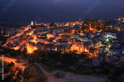 Aerial night view of Chefchaouen in Morocco. The city is noted for its buildings in shades of blue and that makes Chefchaouen very attractive to visitors.