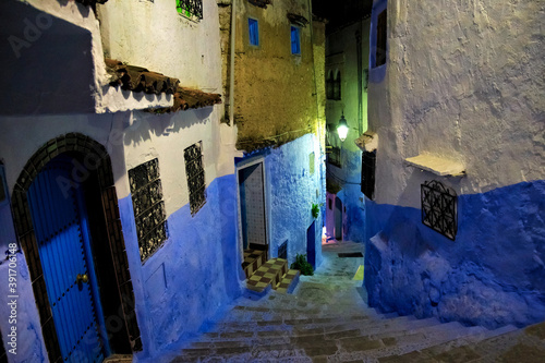 Night view in medina of Chefchaouen, Morocco. The city is noted for its buildings in shades of blue and that makes Chefchaouen very attractive to visitors. © Renar