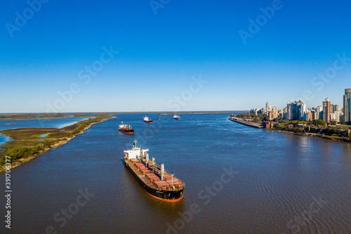 Aerial Shot over  Parana River looking in background Rosario City photo