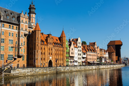 Embankment of Motlawa river in Gdansk in sunny spring day, Poland.