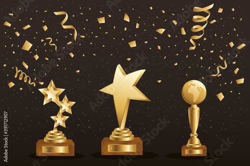 winner three trophies golden with confetti