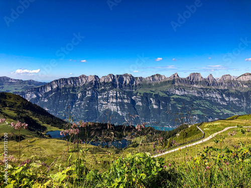 Beautiful mountain chain Panoroma in Flums Switzerland on a sunny day with Leistchamm and Brisi - Drone Perspective Landscape Photography photo