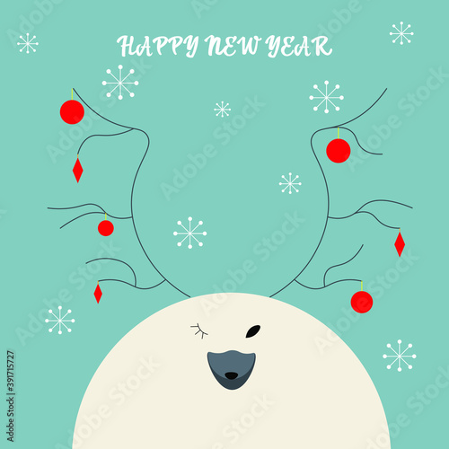 christmas card with a deer in a snowdrift