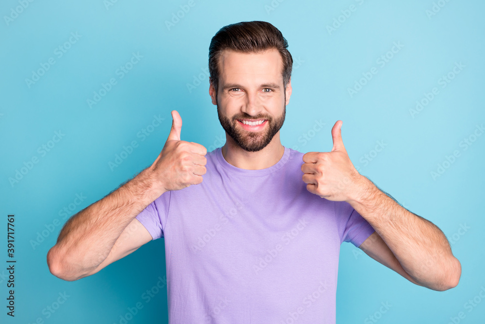 Fototapeta premium Photo of young attractive man show thumbs-up ad promo like perfect choice isolated over blue color background