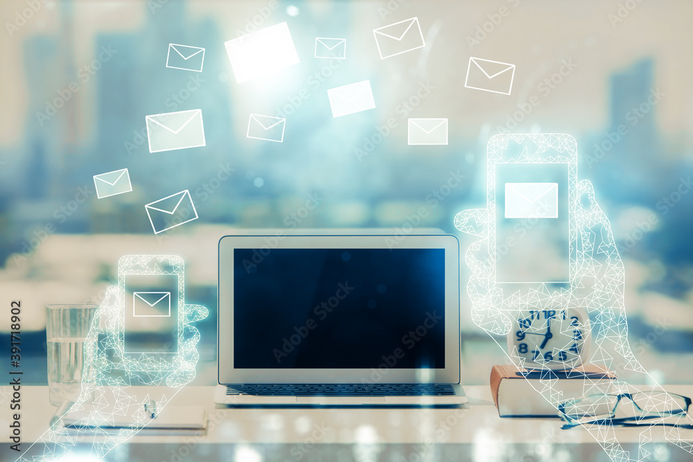 Desktop computer background in office and flying envelops hologram drawing. Double exposure. Electronic mail concept. Desktop computer background in office and flying envelops hologram drawing. Double exposure. Electronic mail concept.