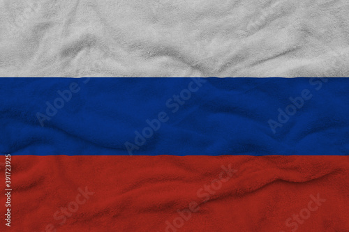 National flag of Russia on fabric texture.