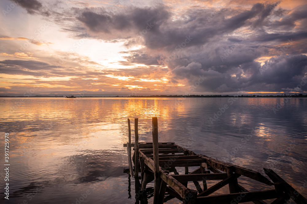 Sunrise over calm water in Tacloban, Philippines