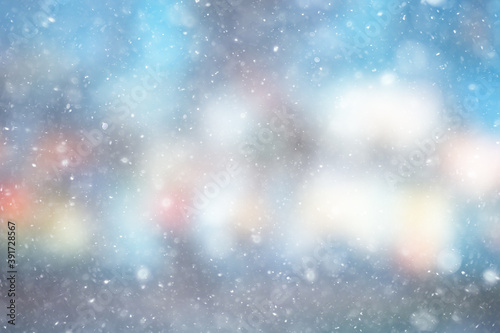 colorful background snow snowfall evening christmas lights, soft light blurry