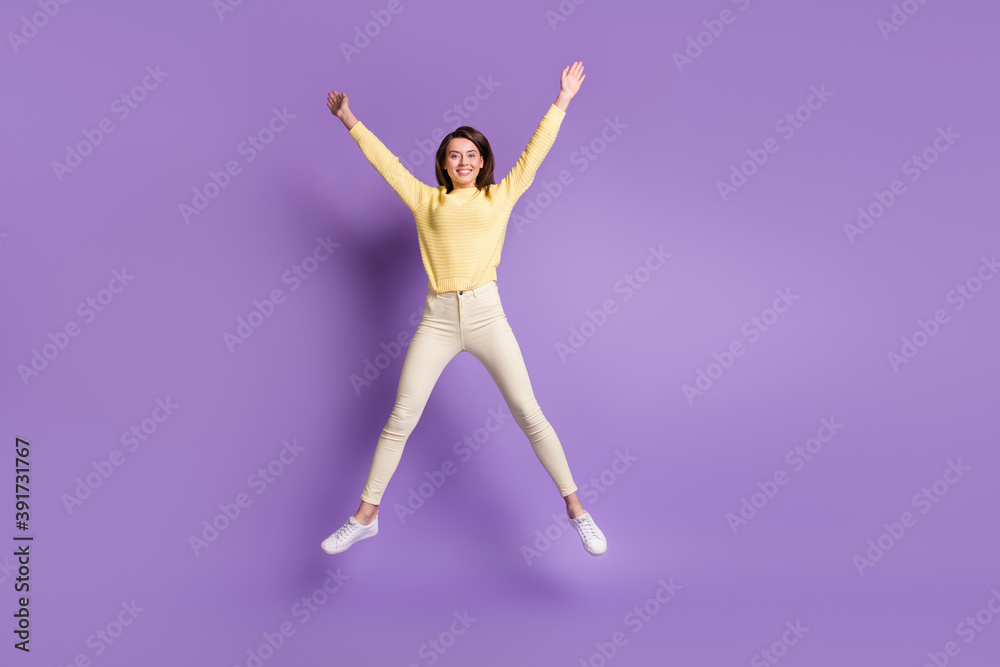 Photo portrait full body view of girl spreading arms legs like star jumping up isolated on bright purple colored background