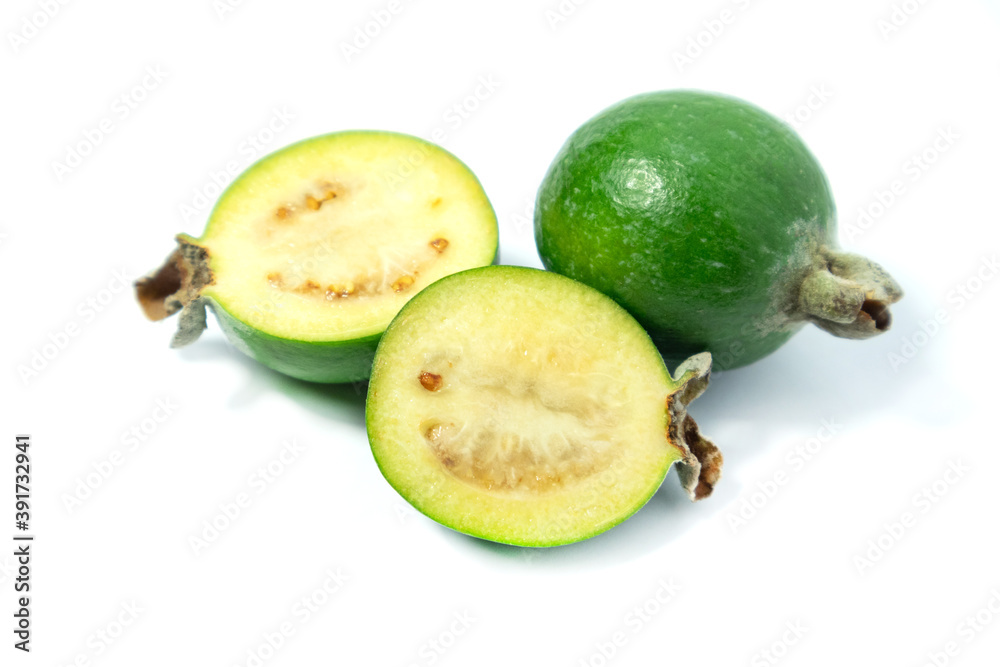 Feijoa fruits on white background. Tropical ripe feijoa fruits. Feijoa fruits on white background. Tropical ripe feijoa fruits.