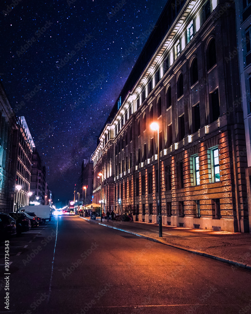 Berlin Germany, urban photography at night in the streets of the city with starry sky