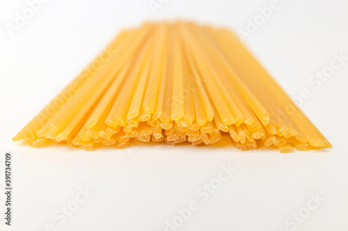 Linguini pasta on white background photo