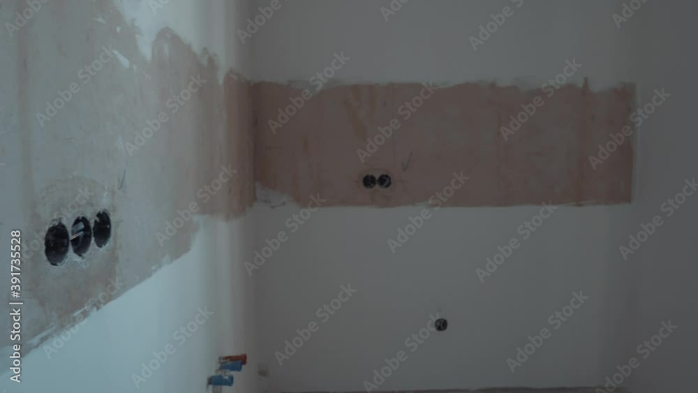 Vidéo Stock White Wall with Circular Electrical Outlets Junction Boxes