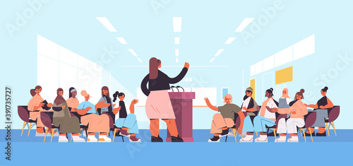 group of mix race female friends discussing during meeting in women's club girls supporting each other union of feminists concept lecture hall interior horizontal full length vector illustration