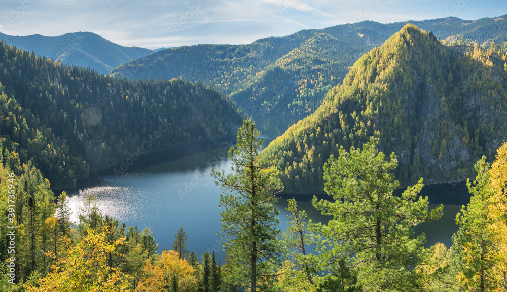 Fototapeta premium Forest Lake. Autumn landscape, sunny day. Taiga, a wild place in Siberia.