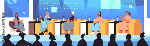 mix race female friends discussing during meeting in women's club girls supporting each other union of feminists concept tv show studio interior horizontal full length vector illustration