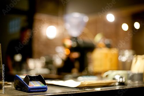 Payment with credit card. EDC machine on cashier restaurant