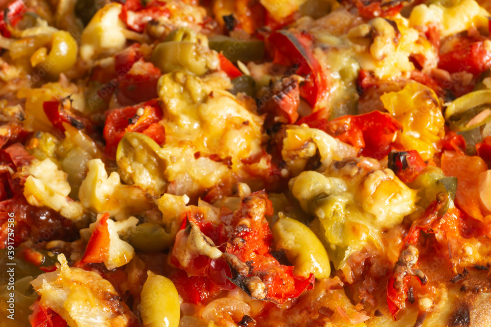 Background from pizza with vegetable close-up Background from pizza with vegetable close-up