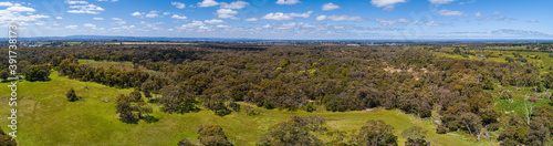 Wide narrow banner aerial panorama of Australian green countryside on bright sunny day photo