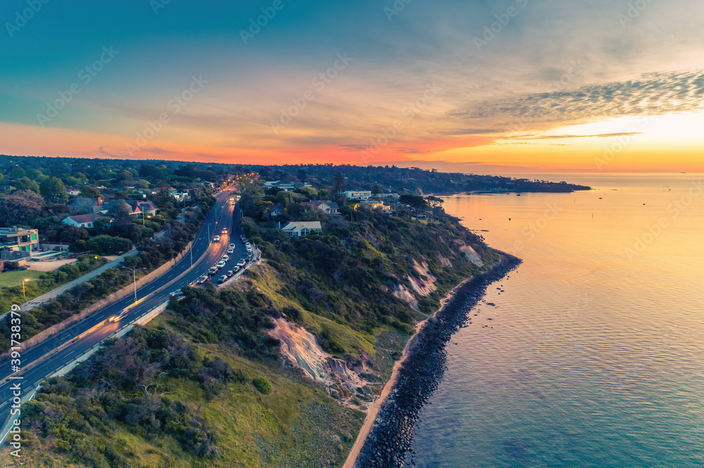 Aerial view of Nepean Highway passing through Olivers Hill in Frankston, Victoria at sunset