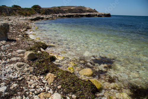 Fototapeta Naklejka Na Ścianę i Meble -  seashore with stones and waves