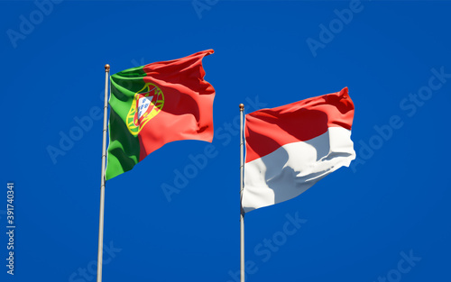 Beautiful national state flags of Portugal and Indonesia.