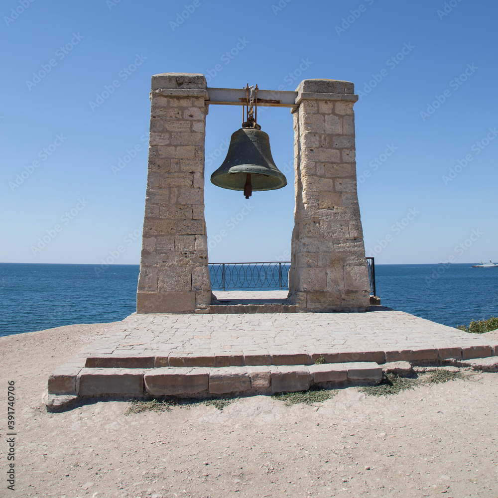 Fototapeta premium bell on the rocky seashore