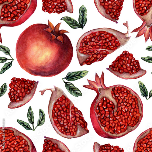 Seamless pattern of whole pomegranate and slices. Watercolor repeating illustration of pomegranate fruits, seeds, slices and leaves. Isolated on white background. Drawn by hand.
